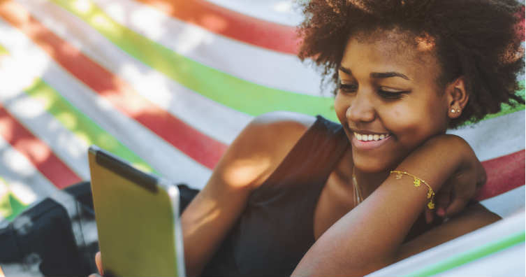 girl reading ebook on tablet ereader