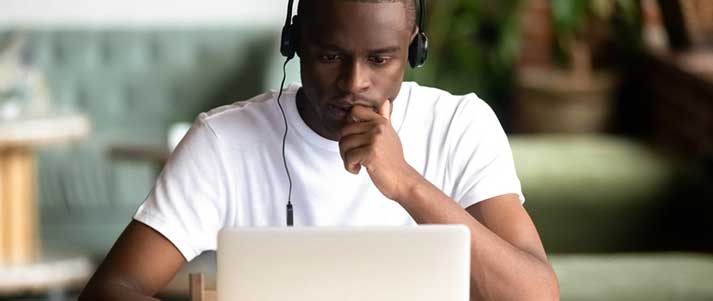 man on laptop concentrating