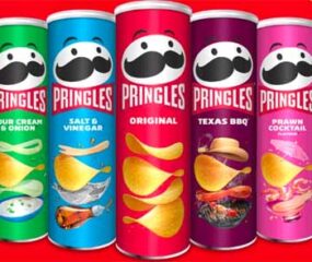 five tubes of pringles in different flavours
