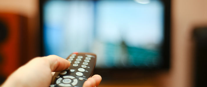 remote control pointed at television